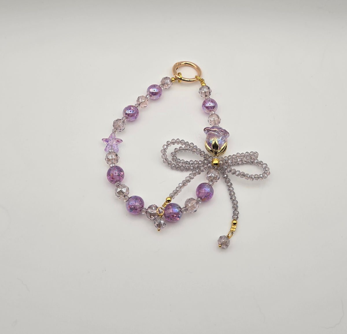 Purple Crystal Bow phone charm with violet beads and sparkling beaded bow