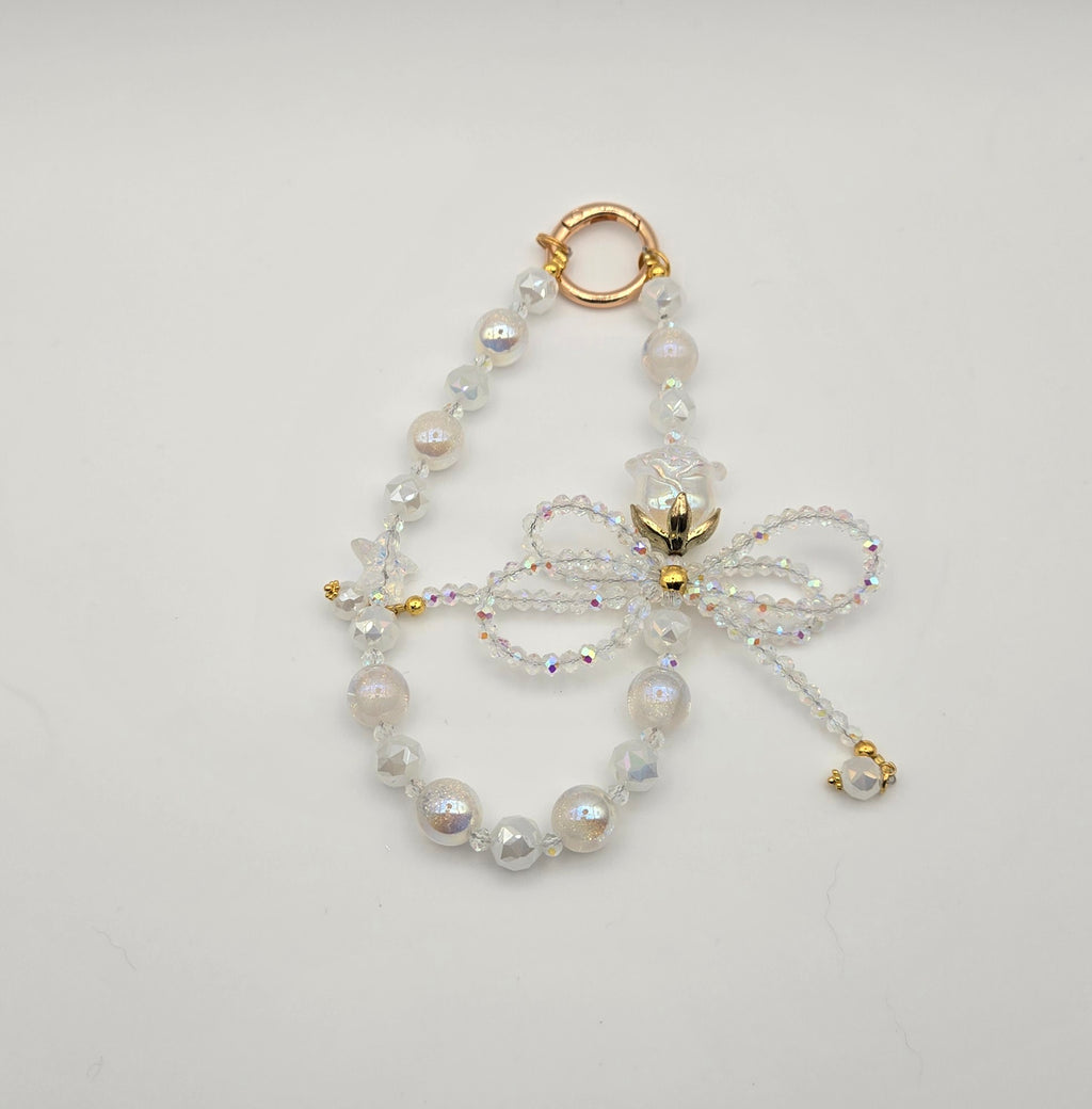 Clear Crystal Bow phone charm with iridescent beads and sparkling beaded bow