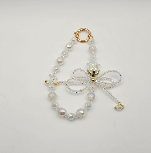 Clear Crystal Bow phone charm with iridescent beads and sparkling beaded bow