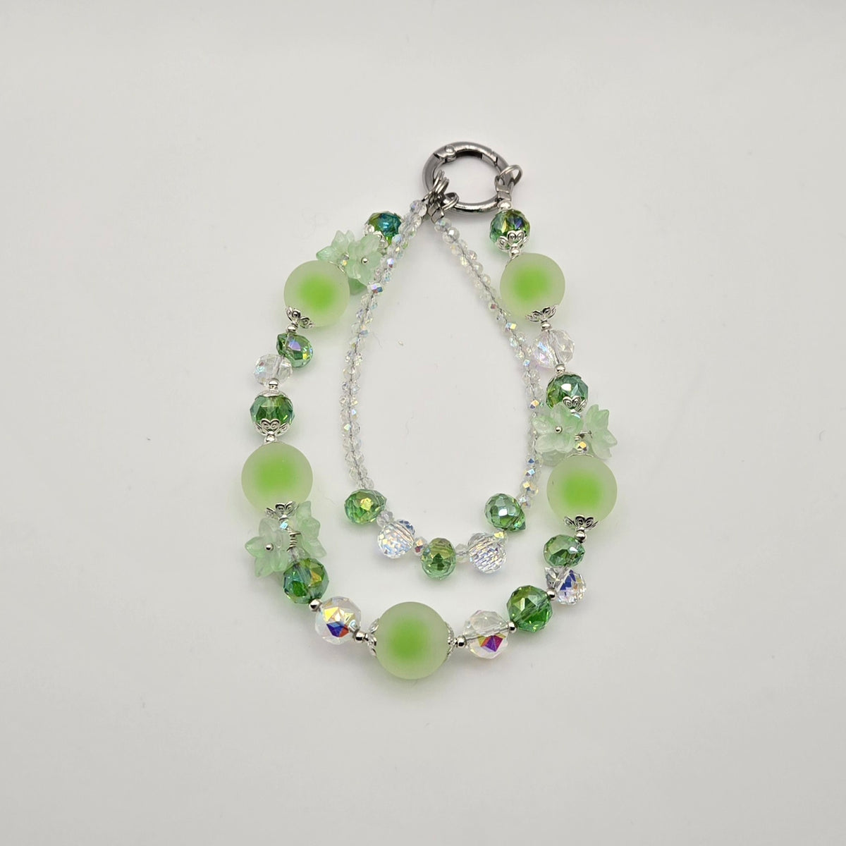 Meadow Bloom green Frosted Blossoms phone charm with frosted beads and green floral accents