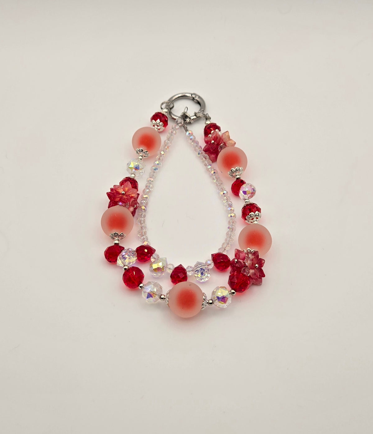 Crimson Bloom red Frosted Blossoms phone charm with frosted beads and red floral accents