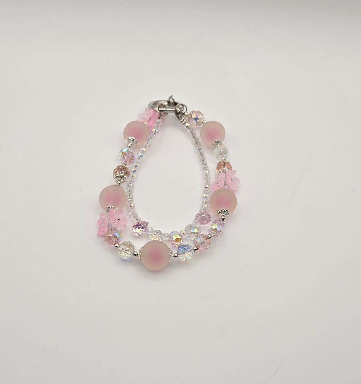 Blush Bloom pink Frosted Blossoms phone charm with frosted beads and sparkling floral accents