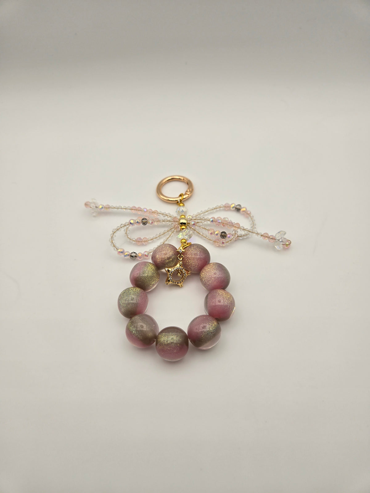 Starlit Bow blush pink beaded phone charm with sparkling beaded bow
