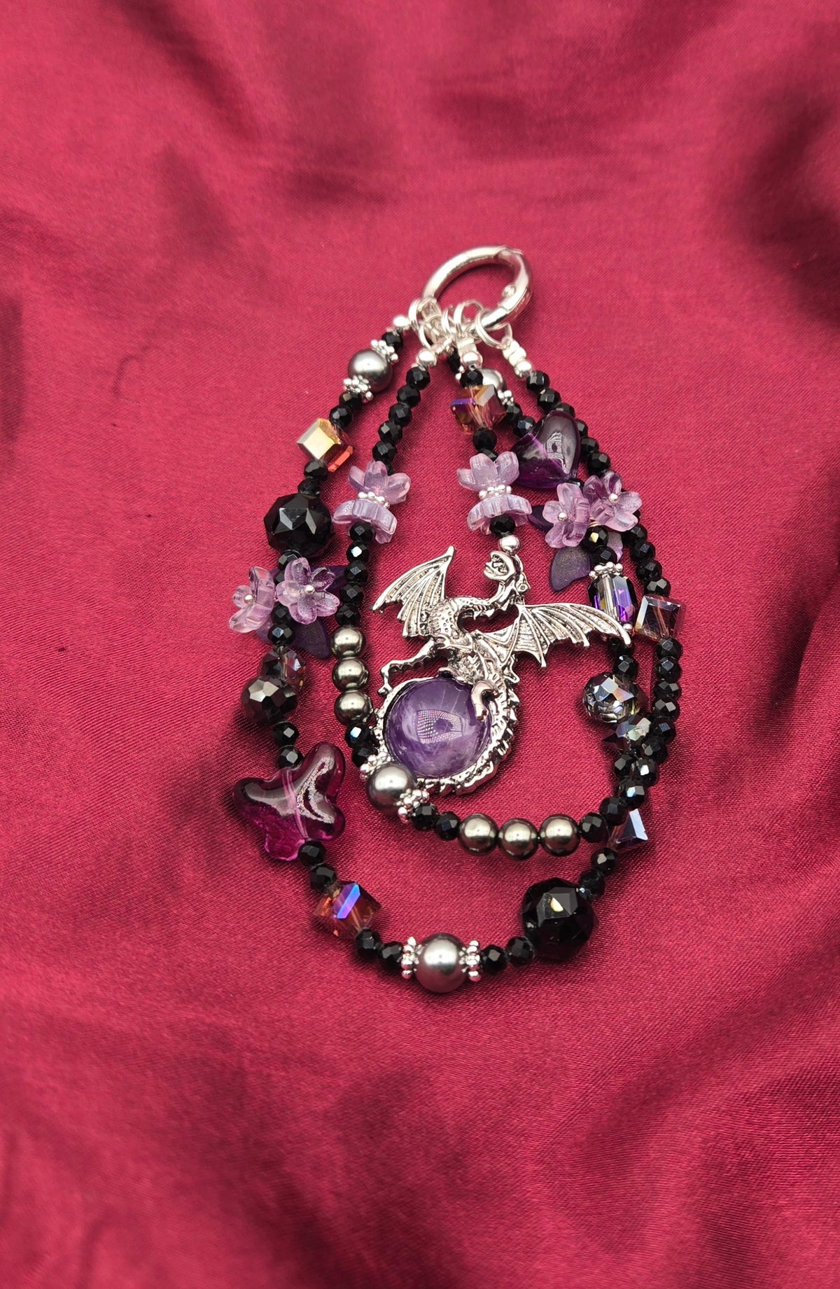Royal Guardian Dragon phone charm with purple, black and silver beads and butterfly accents