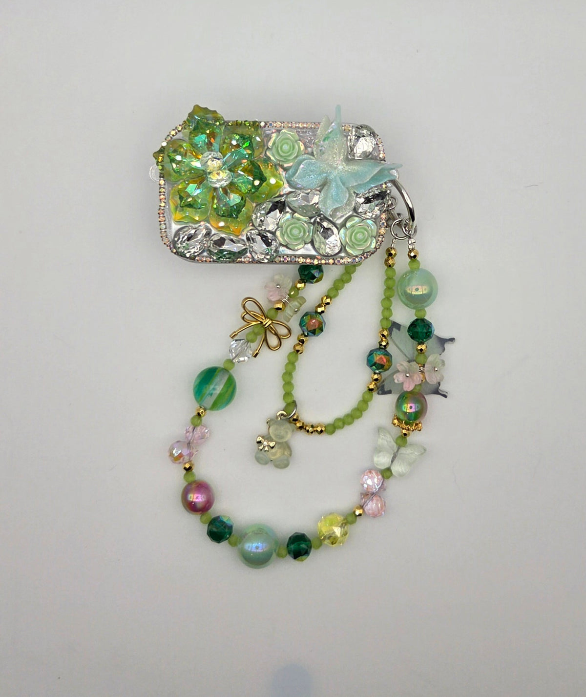 Green floral phone mirror clip displayed with coordinating beaded phone charm