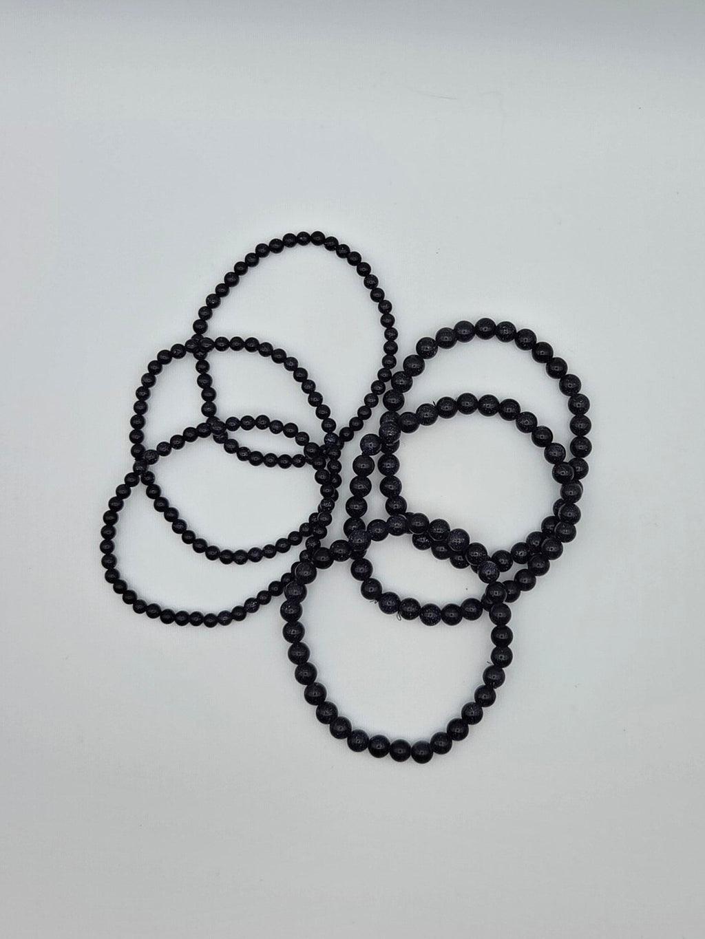 Blue goldstone beaded bracelets in 4mm and 6mm bead sizes