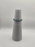 6mm blue apatite beaded bracelet measuring 6.25 inches on a sizing mandrel