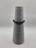 Garnet chip stretch bracelet measuring 6.5 inches on a sizing mandrel